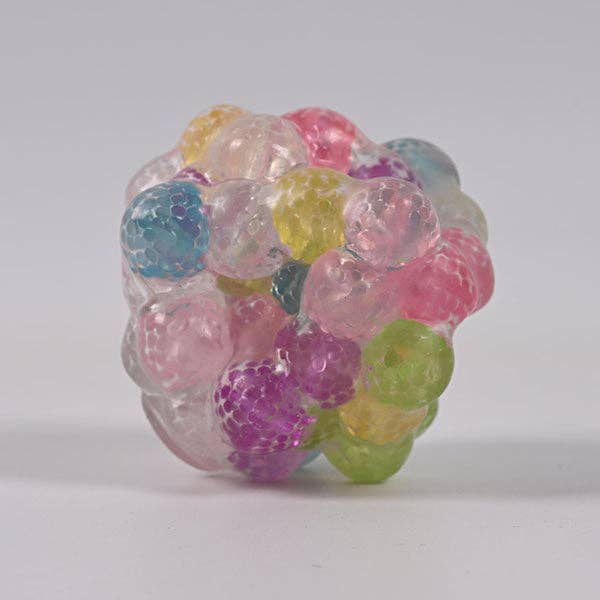 Mellow Monkey Crunch & Squish candy-themed stress ball with multi-colored translucent crunchy sensory beads