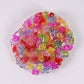Mellow Monkey Crunch & Squish candy-themed stress ball filled with colorful translucent gummy bear fidget charms