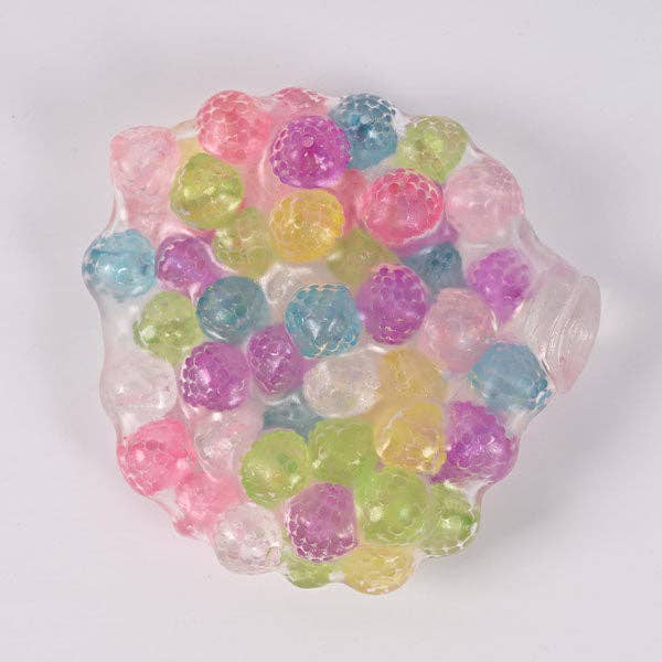 Mellow Monkey Crunch & Squish candy-themed stress ball with colorful textured beads inside a clear squishy shell