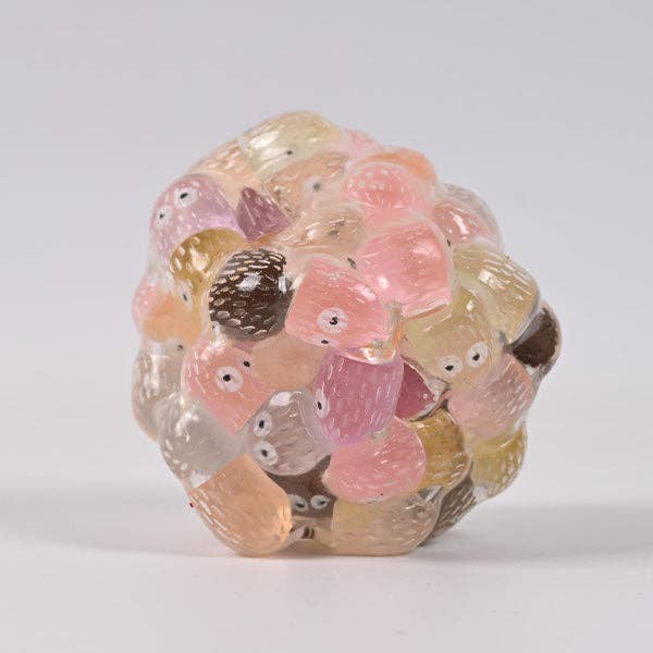 Mellow Monkey Crunch & Squish candy-themed stress ball with a translucent, multi-colored crunchy sensory texture.