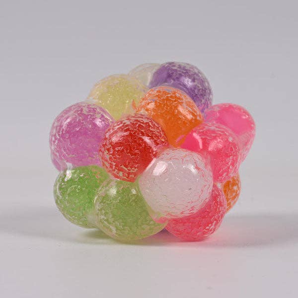 Mellow Monkey candy-themed stress ball with a vibrant, multi-colored squishy texture for sensory fidget play.
