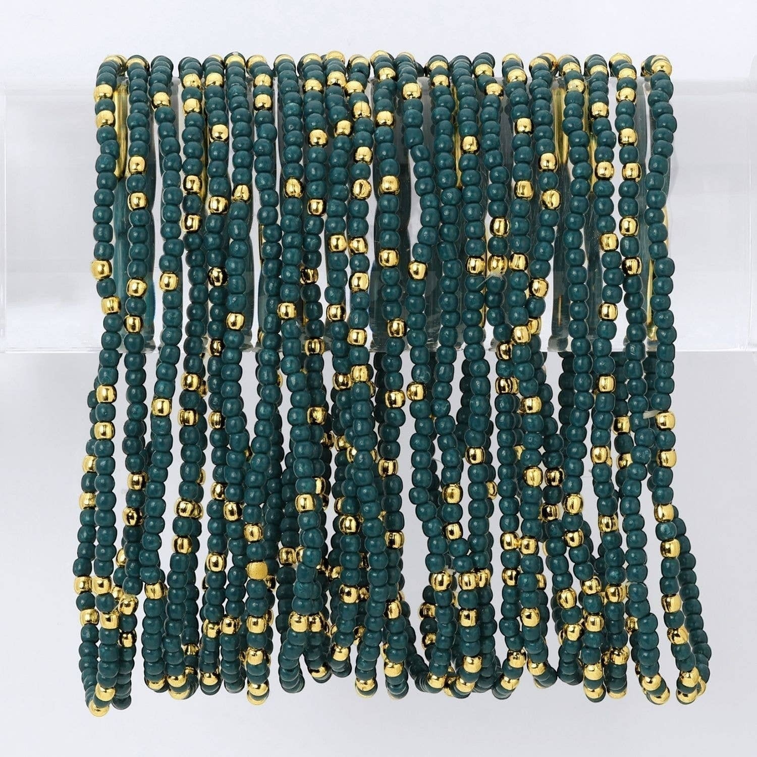 Mellow Monkey dark teal seed bead stretch bracelets with 18K gold plated brass accents in a stackable design.