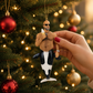 Mellow Monkey December Diamonds merman ornament with a whale tail, sunglasses, and ice cream on a Christmas tree.