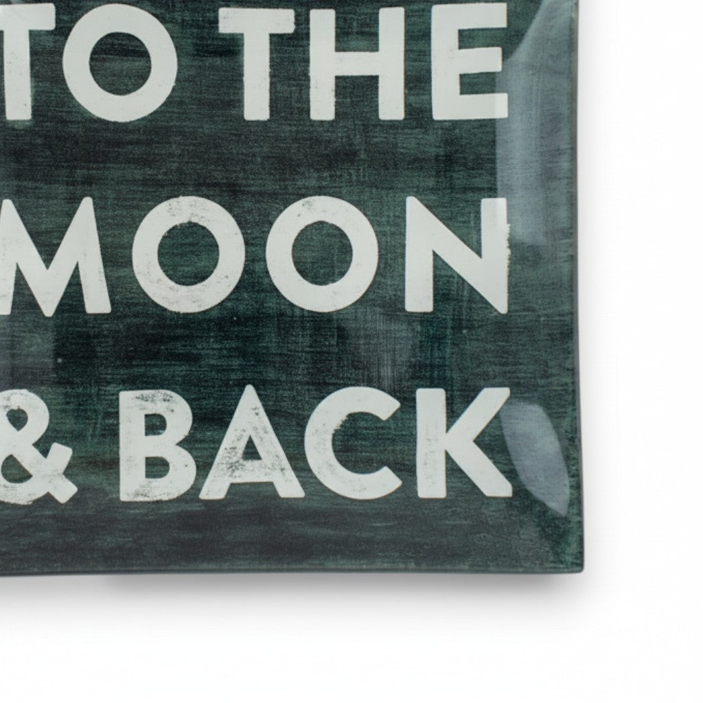 Mellow Monkey To The Moon & Back 6-inch square decoupage plate with white text on a dark green distressed background.