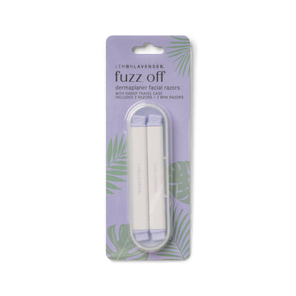 Mellow Monkey Fuzz Off dermaplaner facial razors in purple packaging with green palm leaf accents. Includes 2 razors and 2 mini razors with a travel case.