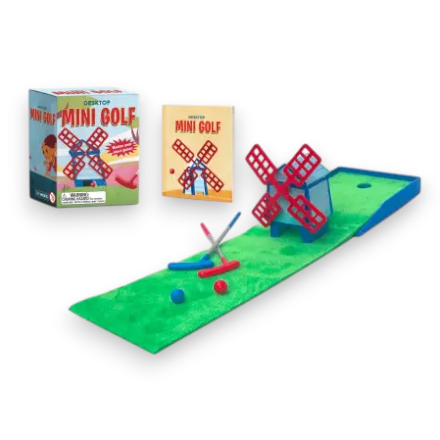 Mellow Monkey Desktop Mini Golf set featuring a green putting mat, wind-up windmill, two putters, balls, and guidebook.