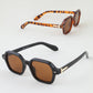 Mellow Monkey Modern Diamond Block sunglasses featuring black and tortoiseshell polygonal frames with metal stud details