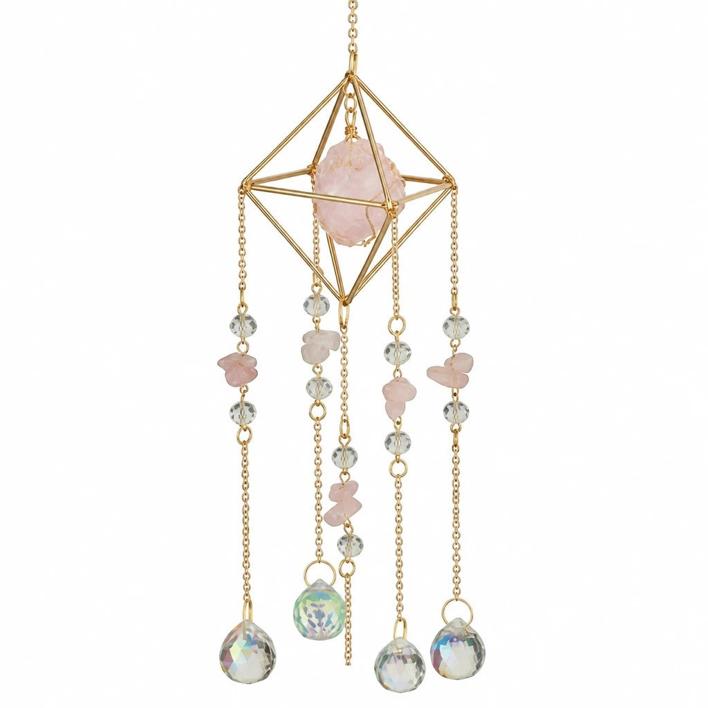 Mellow Monkey Diamond Rose suncatcher with pink healing stones, clear crystals, and gold chains on a geometric frame.