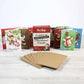 Mellow Monkey 12 Days of Dirty & Flirty Christmas card set with miniature cards, kraft envelopes, and gift box.