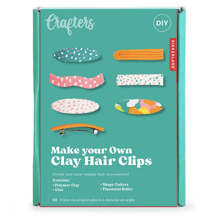 Mellow Monkey DIY clay hair clip making kit with polymer clay, cutters, roller, and glue in a teal box.