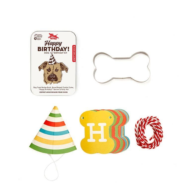 Mellow Monkey Dog Birthday Kit includes a striped party hat, bone-shaped cookie cutter, and banner.
