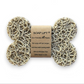 Mellow Monkey dog bone shaped bioplastic soap lift for draining bar soap, beige color, made in the USA.