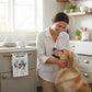 Mellow Monkey 100% cotton kitchen towel with a dog graphic and text that reads "we don't need a dishwasher we have a dog."