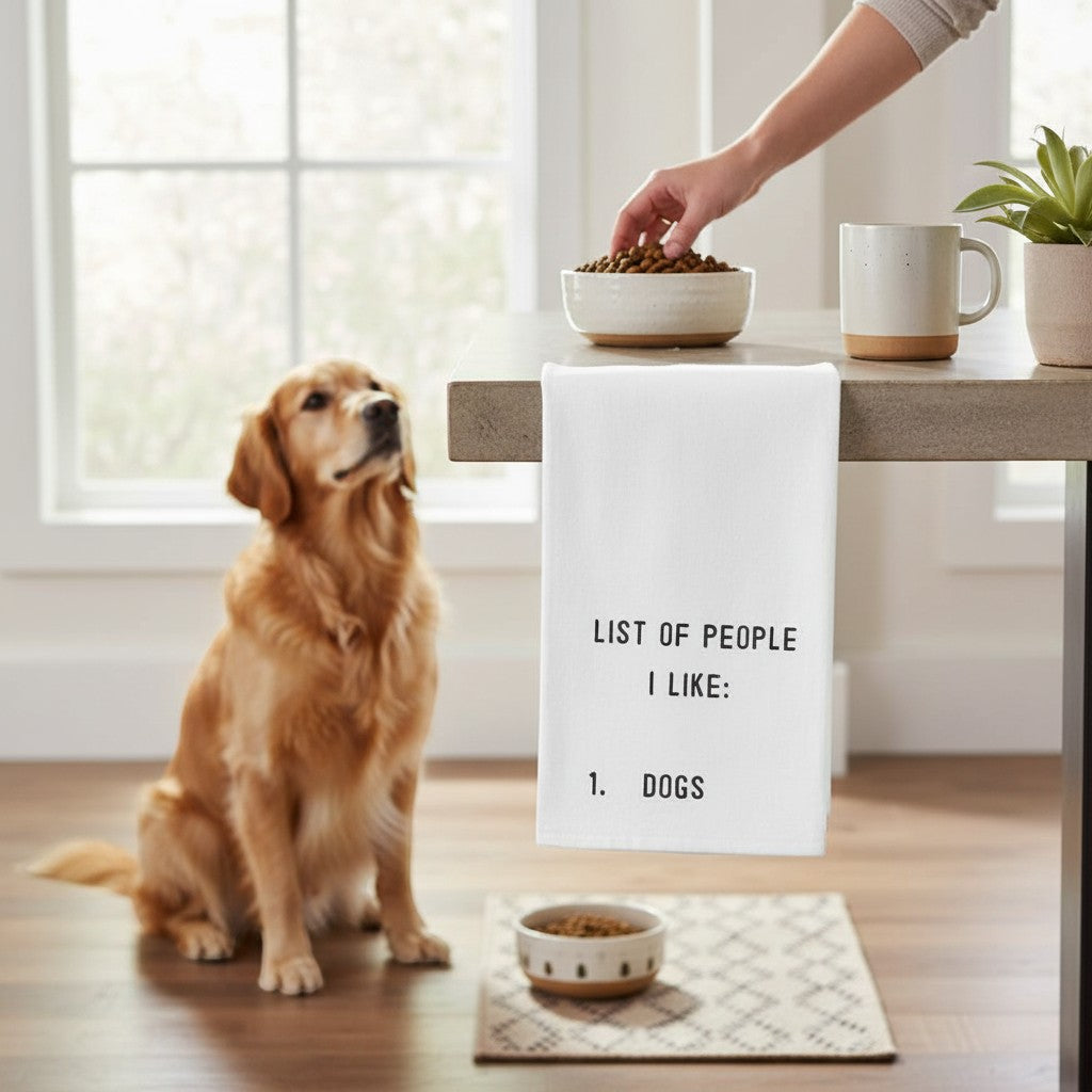 Mellow Monkey white 100% cotton tea towel with black text "LIST OF PEOPLE I LIKE: 1. DOGS".