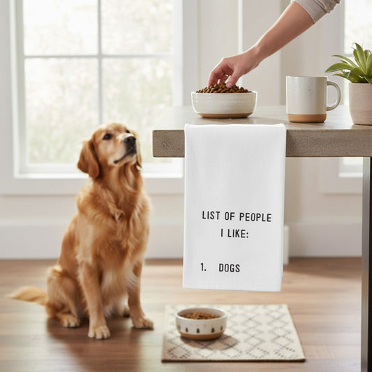 Mellow Monkey white 100% cotton tea towel with black text "LIST OF PEOPLE I LIKE: 1. DOGS".