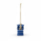 Mellow Monkey resin dog ornament featuring a sculpted pup sitting in a blue wingback chair with a gold hanging cord.