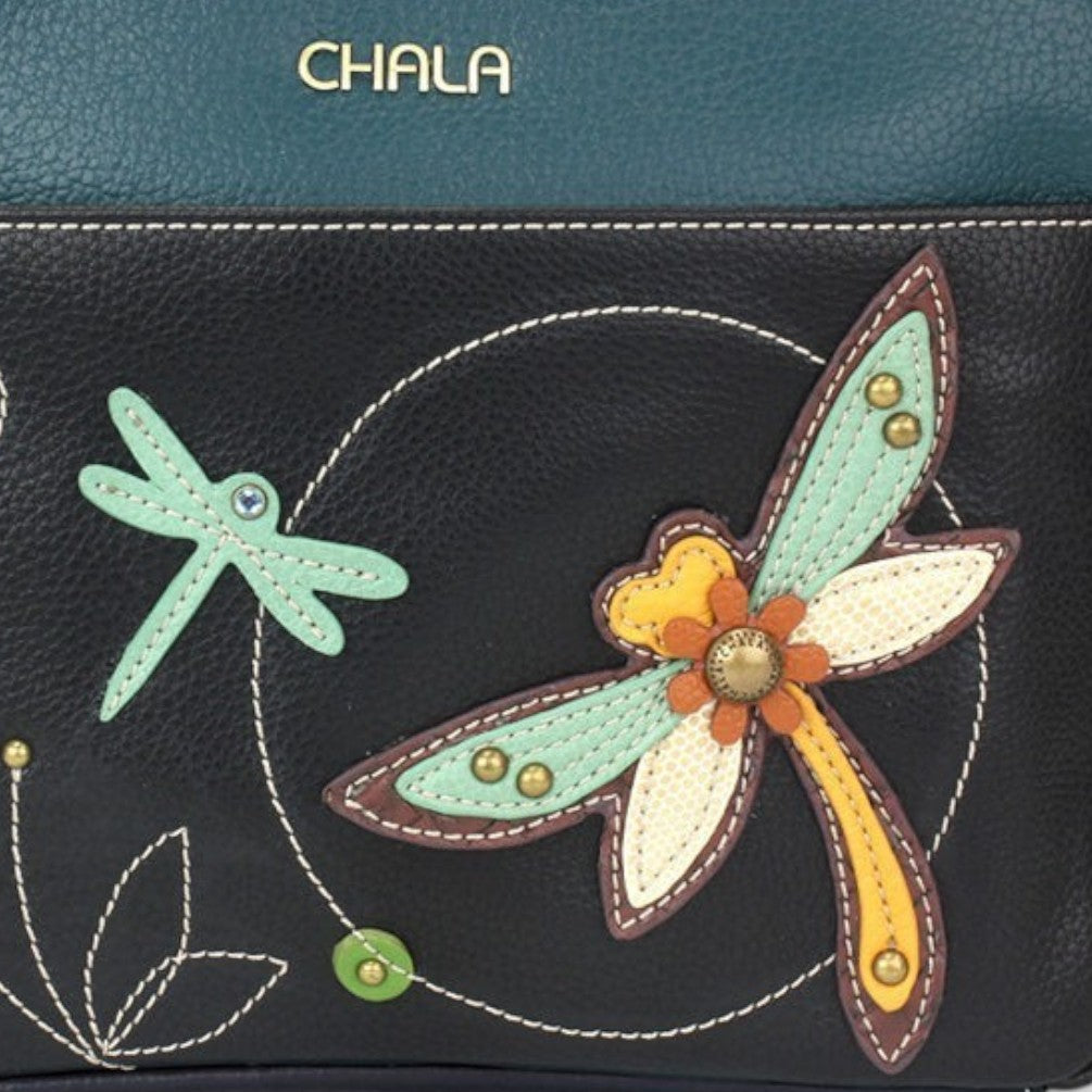 Mellow Monkey black faux leather crossbody bag with dragonfly applique and teal top panel.