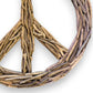 Mellow Monkey 20-inch driftwood peace sign wall decor with natural, weathered finish and bohemian charm.