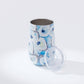 Mellow Monkey 16oz stainless steel wine tumbler with a blue and white abstract Ebb and Flow pattern and sliding lid.