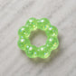 Mellow Monkey Ecto Cooler Feelzies Original Squishy Bracelet in translucent green with sparkling glitter accents.