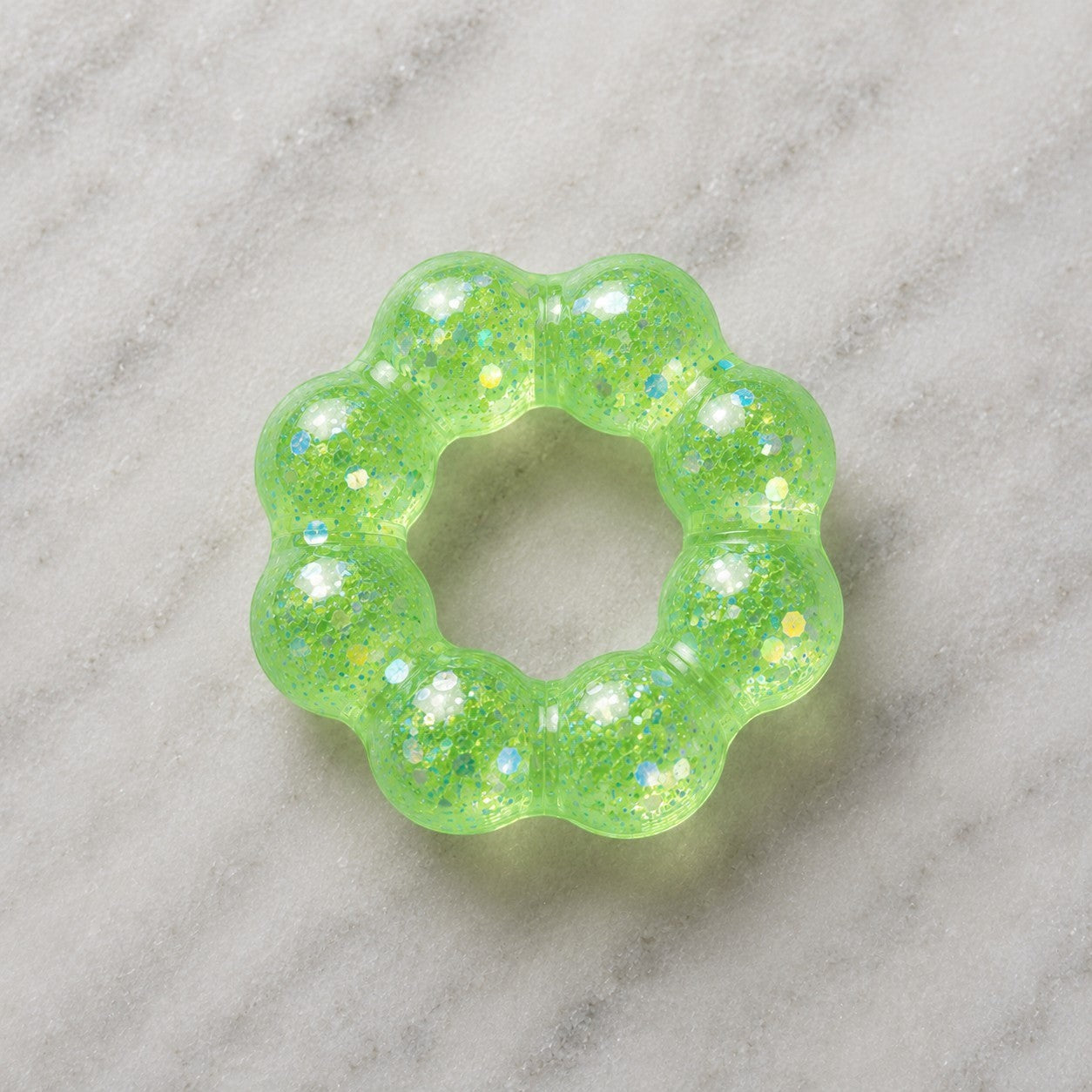 Mellow Monkey Ecto Cooler Feelzies Original Squishy Bracelet in translucent green with sparkling glitter accents.