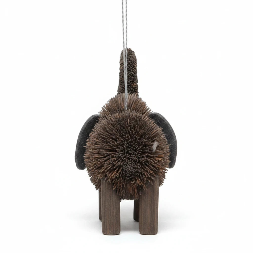 Mellow Monkey elephant holiday ornament made from natural bottle brush fibers with a rustic brown finish.
