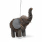 Mellow Monkey elephant holiday ornament made from natural bottle brush fibers with a grey felt ear on white background
