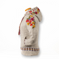 Mellow Monkey light natural wool zip hoodie with vibrant floral embroidery on the hood and shoulders, side view.
