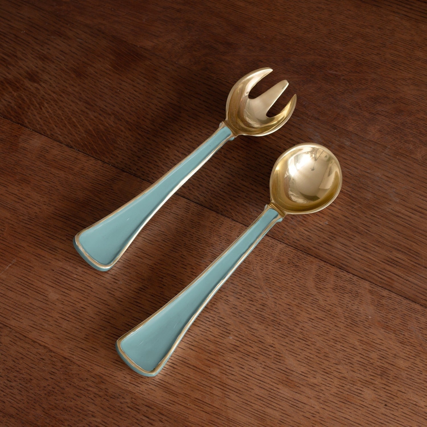 Mellow Monkey ENCANTO Soho salad servers in turquoise with gold accents. Set includes one fork and one spoon, made of aluminum alloy with enamel finish.