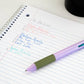 Mellow Monkey multicolor retractable erasable pen with a soft grip resting on a handwritten to-do list on lined paper.