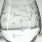 Mellow Monkey 18-oz balloon red wine glass featuring an etched and polished school of fish design on clear glass.