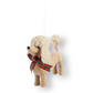 Mellow Monkey fabric poodle Christmas ornament with curly fur and a festive plaid bow on a white background