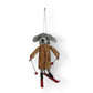 Mellow Monkey handcrafted wool felt dog ornament wearing a gold quilted coat and red skis for winter holiday decor.