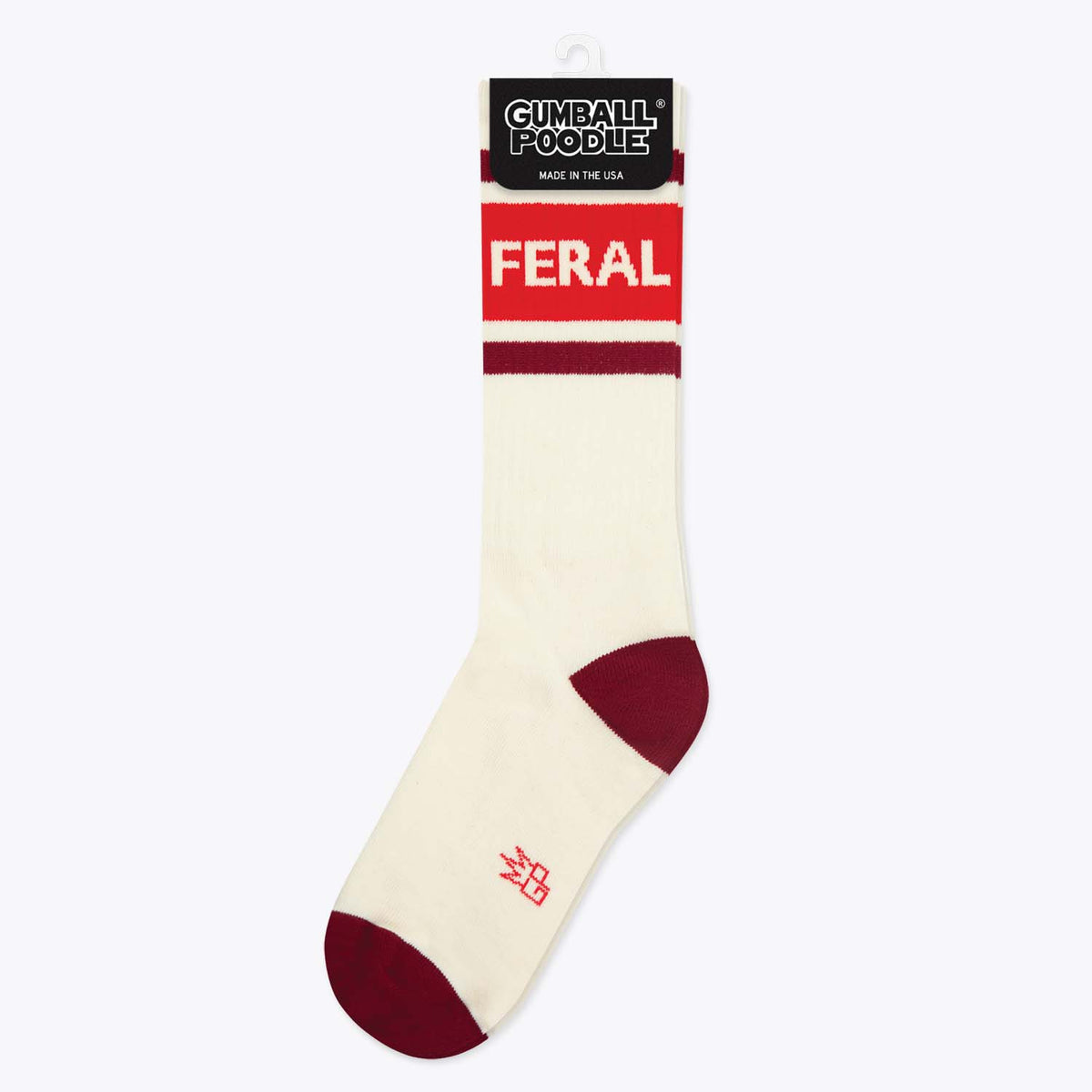 Mellow Monkey Feral gym crew socks in cream with red stripes and FERAL text on the cuff