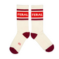 Mellow Monkey Feral gym crew socks in cream with red stripes and FERAL text, featuring a mid-calf cuff design.