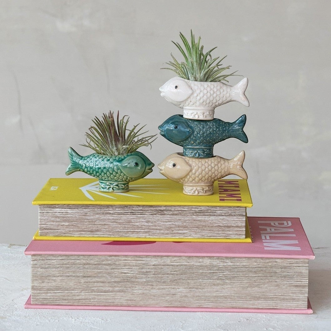 Mellow Monkey stoneware fish shaped container in blue, green, white, and taupe. Use as a toothpick holder or planter.