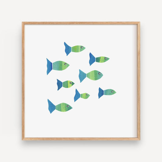 Mellow Monkey Fishies Framed Art Print, a school of green and blue fish swimming together in a wooden frame.