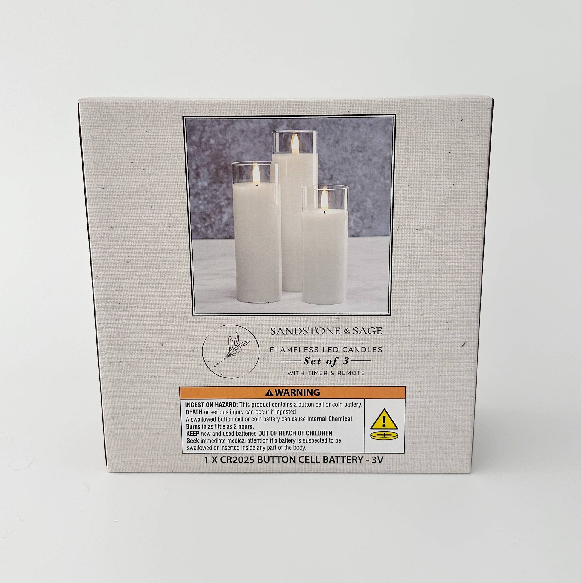 Mellow Monkey set of three white flameless LED glass pillar candles with remote and timer in retail packaging