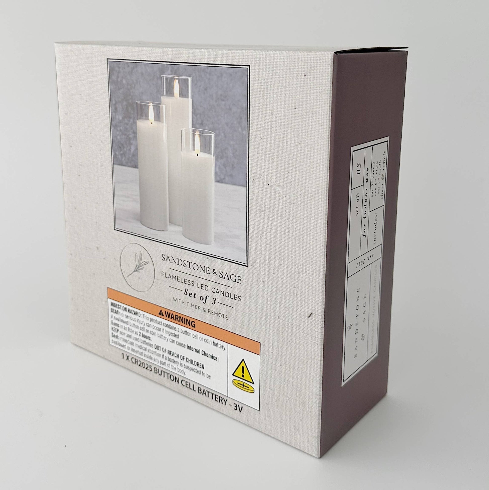 Mellow Monkey set of 3 white flameless LED glass pillar candles in retail packaging with remote and timer features.