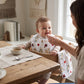 Mellow Monkey 2-in-1 floral baby bib and burp cloth in bamboo cotton blend with red heart and flower print