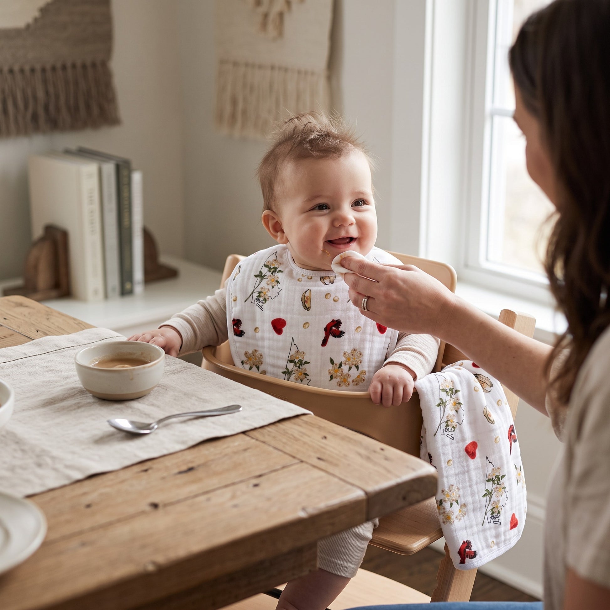 Mellow Monkey 2-in-1 floral baby bib and burp cloth in bamboo cotton blend with red heart and flower print