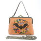 Mellow Monkey linen blend handbag featuring an embroidered bat and floral wreath with a vintage kiss lock clasp.