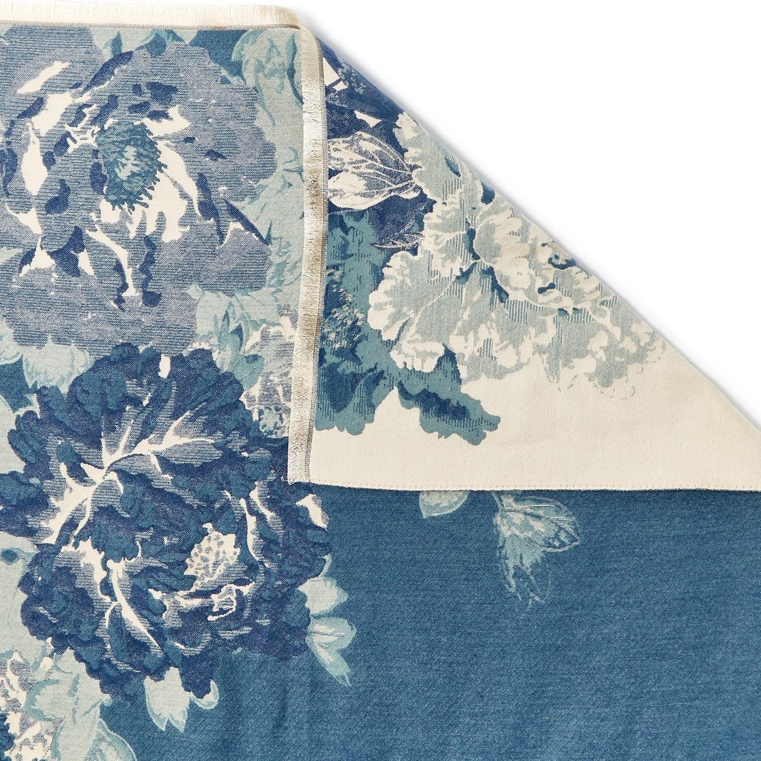Mellow Monkey double-sided floral shawl scarf in blue and cream with soft acrylic fabric and eyelash fringe trim.