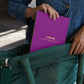 Mellow Monkey Foodie Fun FlowArt hidden patterns coloring book being placed into a green bag