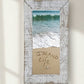 Mellow Monkey rustic white washed wood framed beach scene with "Island Life" written in sand and a starfish.