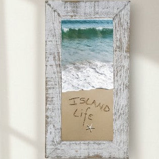 Mellow Monkey rustic white washed wood framed beach scene with "Island Life" written in sand and a starfish.