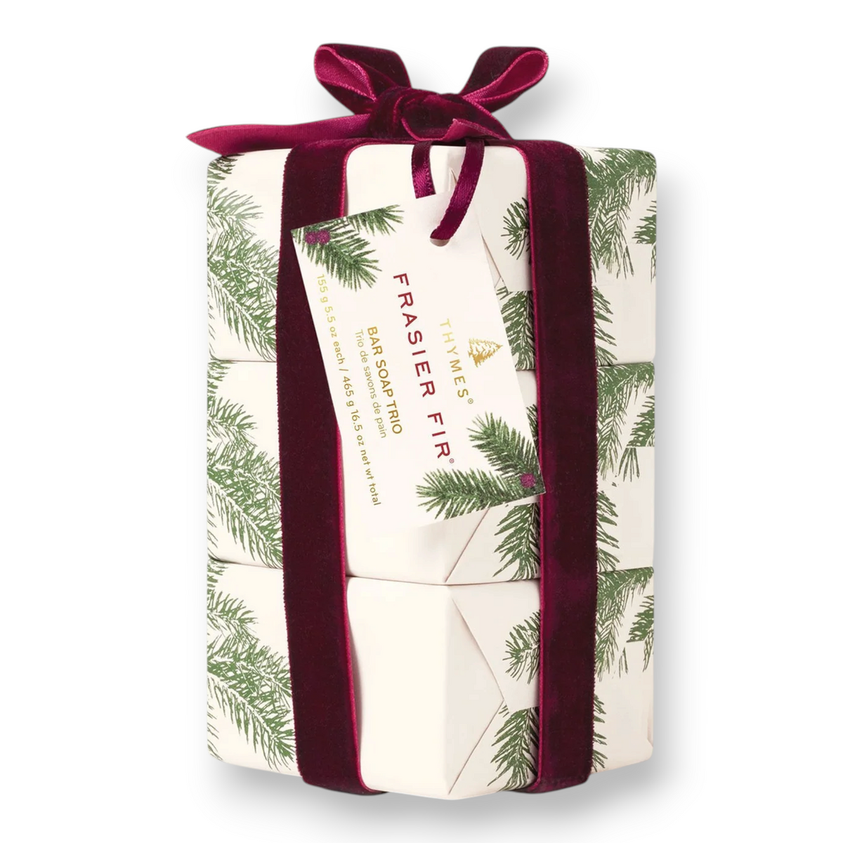 Mellow Monkey Frasier Fir bar soap trio wrapped in pine-patterned paper with a deep red velvet ribbon gift bow