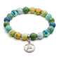 Mellow Monkey Friend bracelet featuring colorful patterned polymer clay beads, silver spacers, and a heart charm.