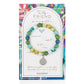 Mellow Monkey Friend bracelet with colorful polymer clay beads, silver spacers, and a prayer box charm on a gift card.