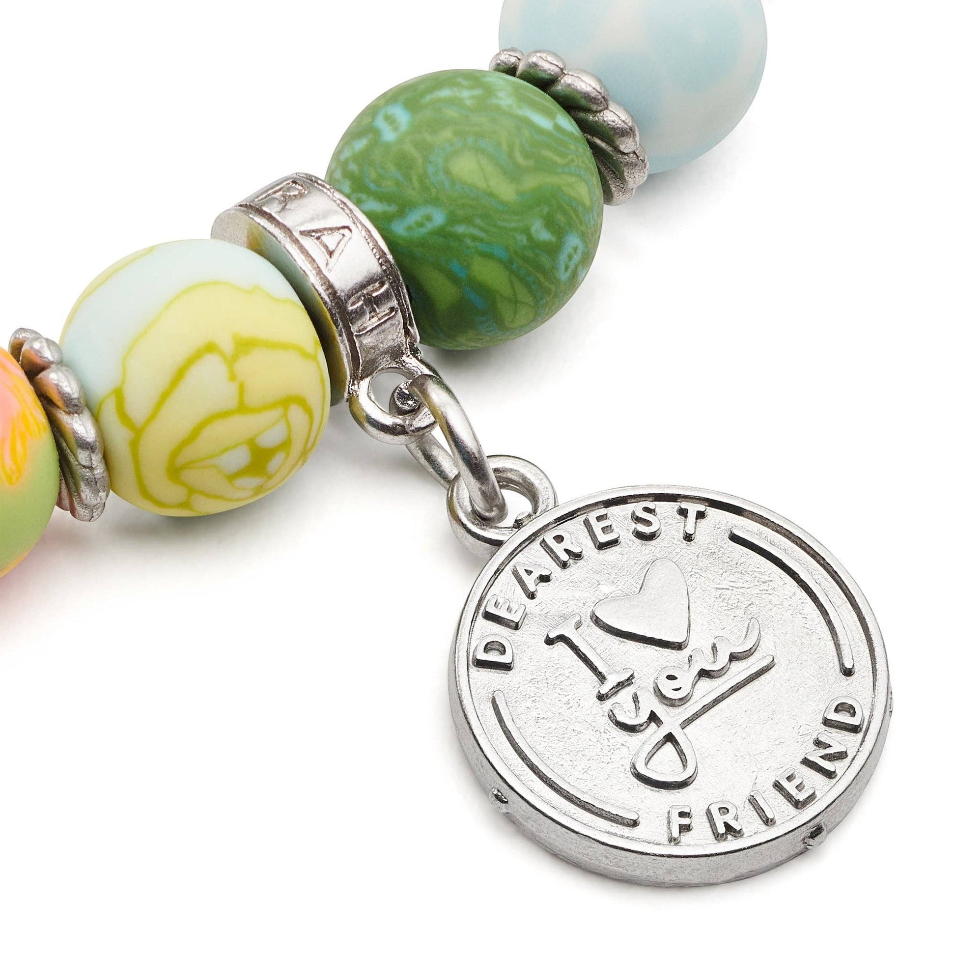 Mellow Monkey Friend bracelet with colorful polymer clay beads and a silver charm engraved with Dearest Friend I love you